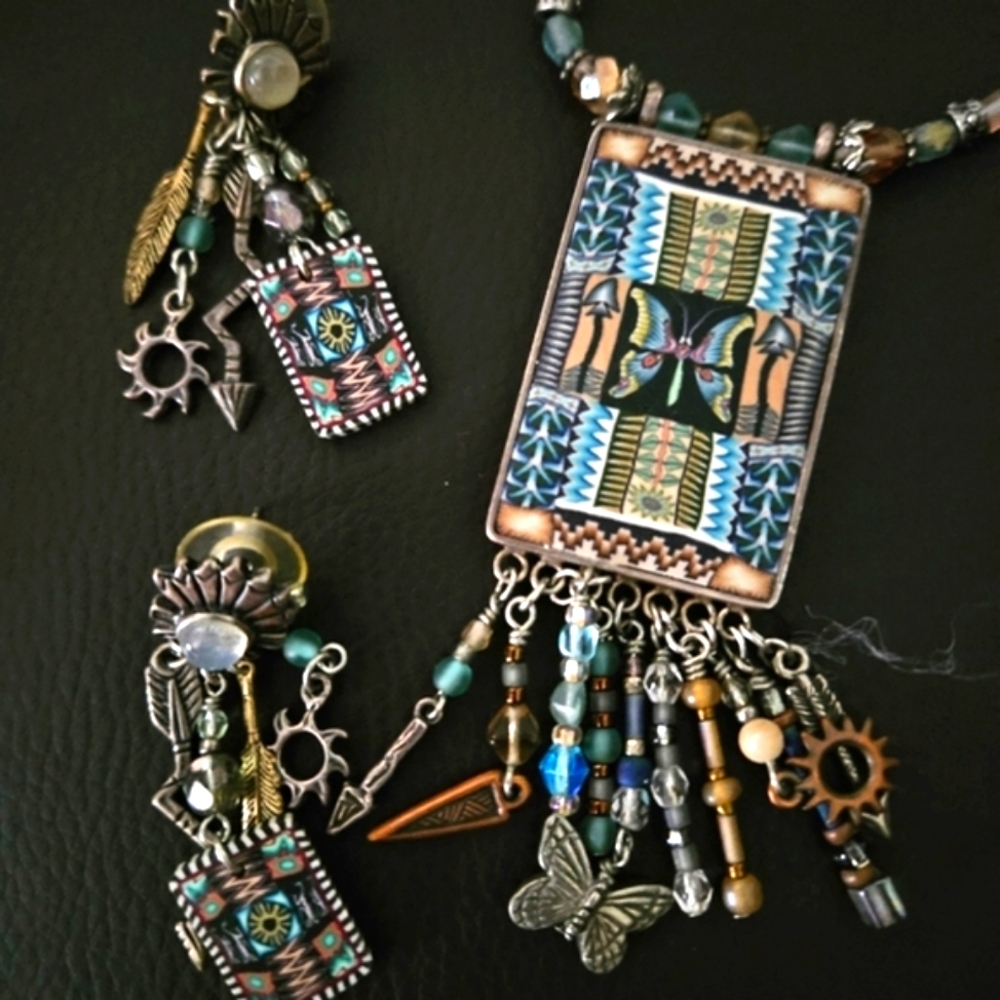 Mosaic necklace and earrings from art festival